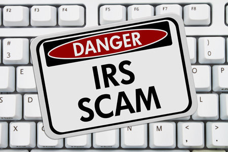 Sign IRS Scam Keyboard Blog Photo Compressed